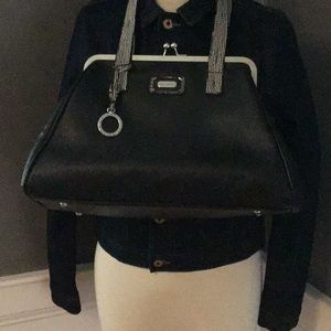 Black Catherine Malandrino handbag.